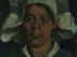 戴白色帽子的农妇头像Head of a woman wearing a white cap