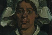 戴白色帽子的农妇头像Head of a woman wearing a white cap